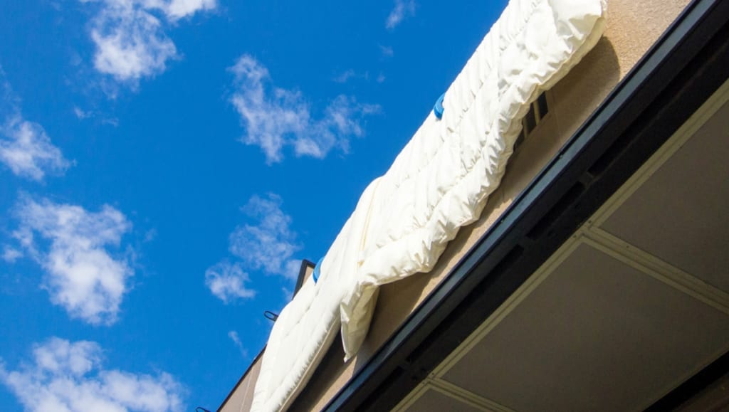 ふとんを乾かすには、天日干しとふとん乾燥機のどちらが効果的ですか？